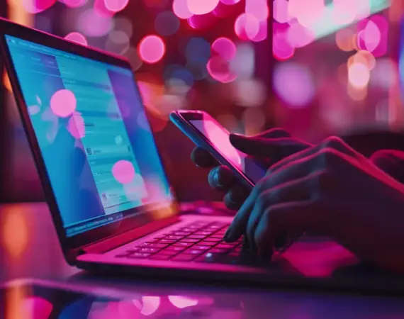 person creating account on her mobile and computer